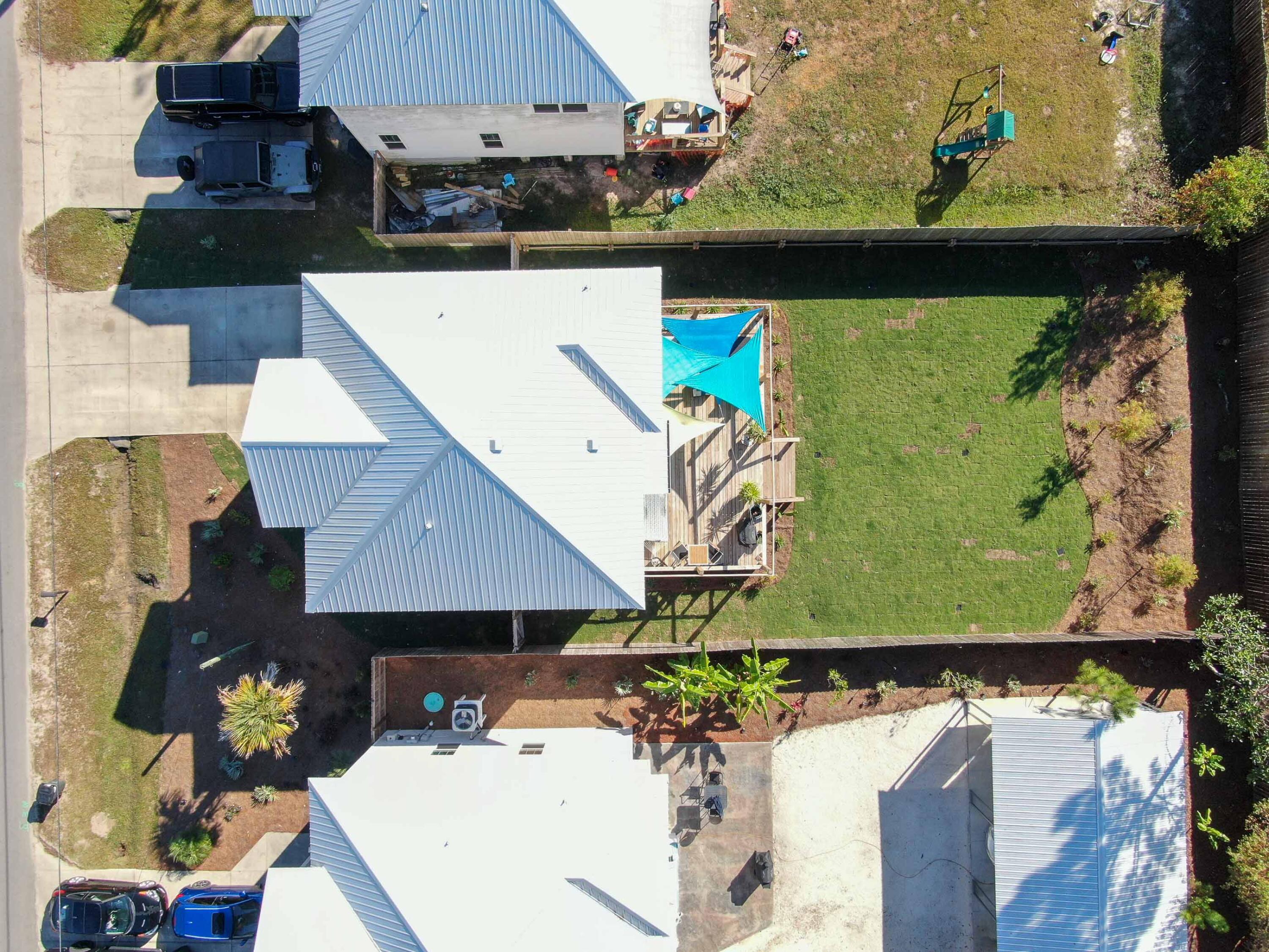 275 Indian Woman Road Santa Rosa Beach, FL 32459 - Photo 23 of 43 an aerial view of a house with a yard