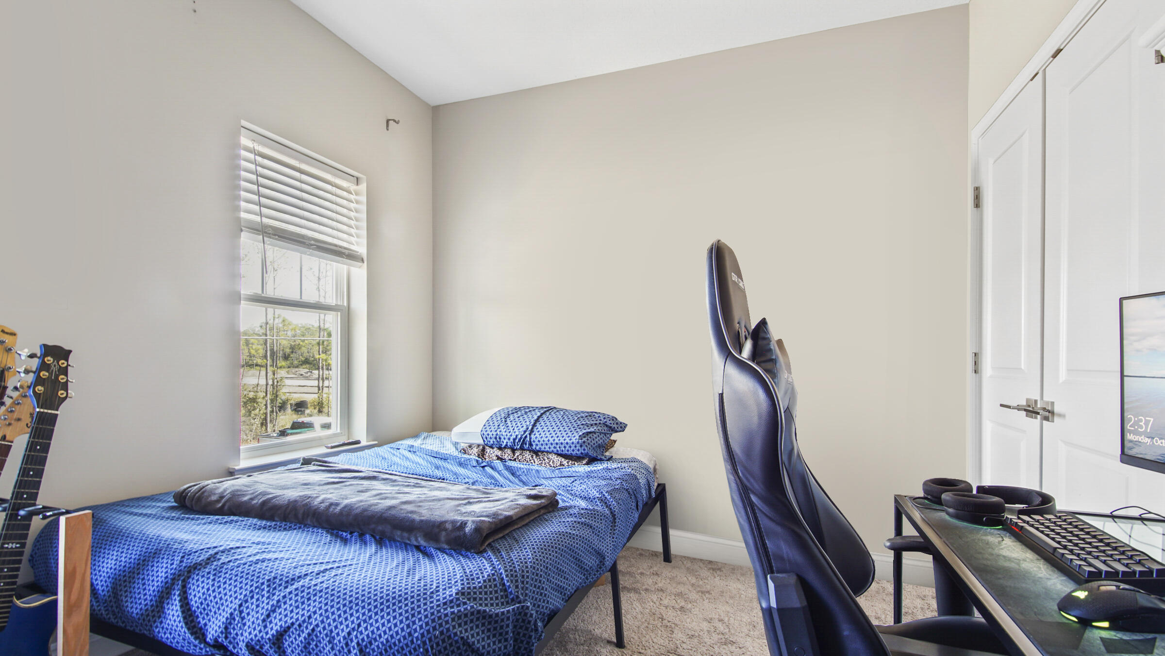 275 Indian Woman Road Santa Rosa Beach, FL 32459 - Photo 30 of 43 a bedroom with a bed and a window