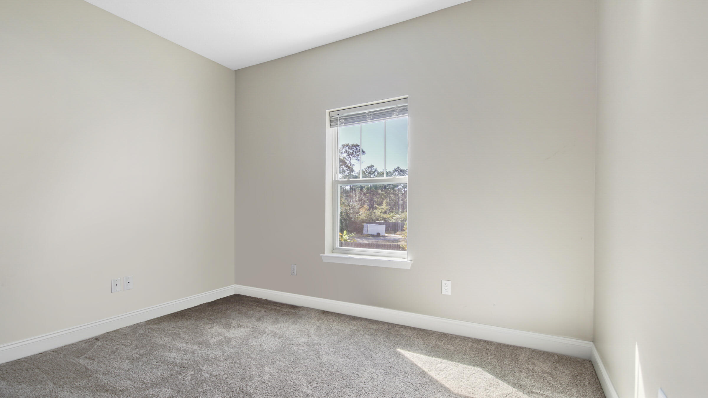 275 Indian Woman Road Santa Rosa Beach, FL 32459 - Photo 32 of 43 an empty room with a window
