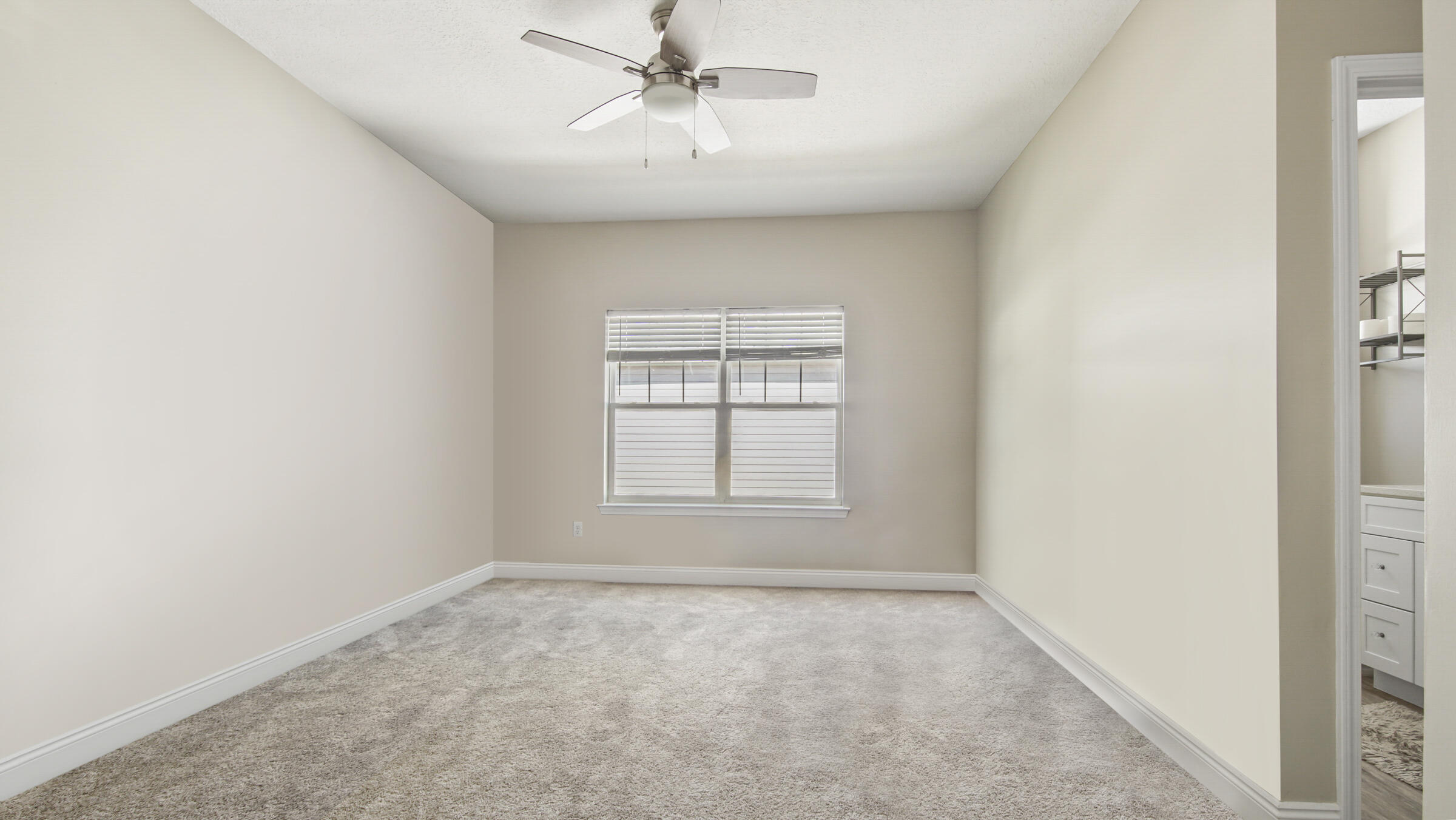 275 Indian Woman Road Santa Rosa Beach, FL 32459 - Photo 34 of 43 wooden floor in an empty room with a window