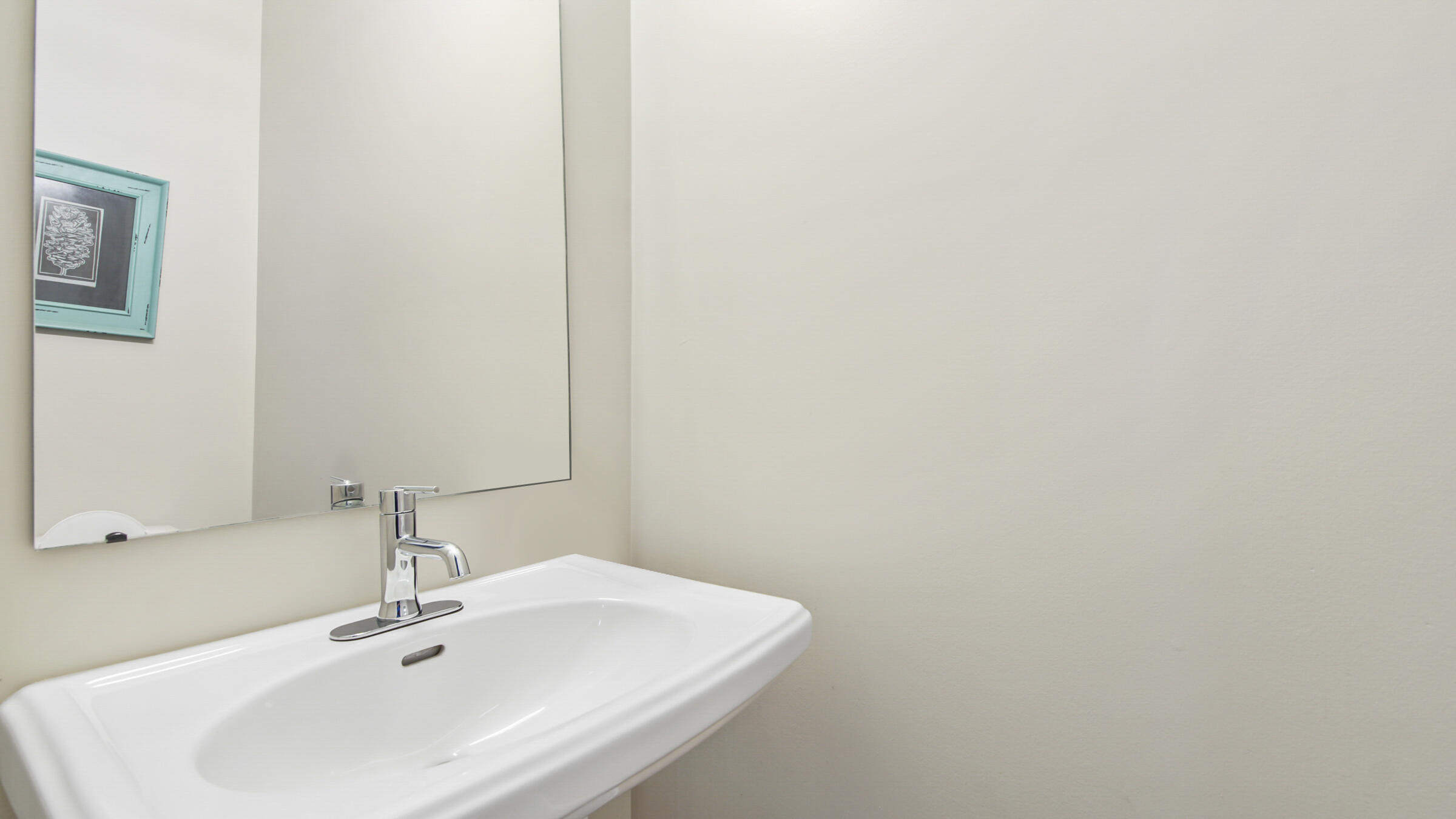 275 Indian Woman Road Santa Rosa Beach, FL 32459 - Photo 36 of 43 a bathroom with a sink and a mirror