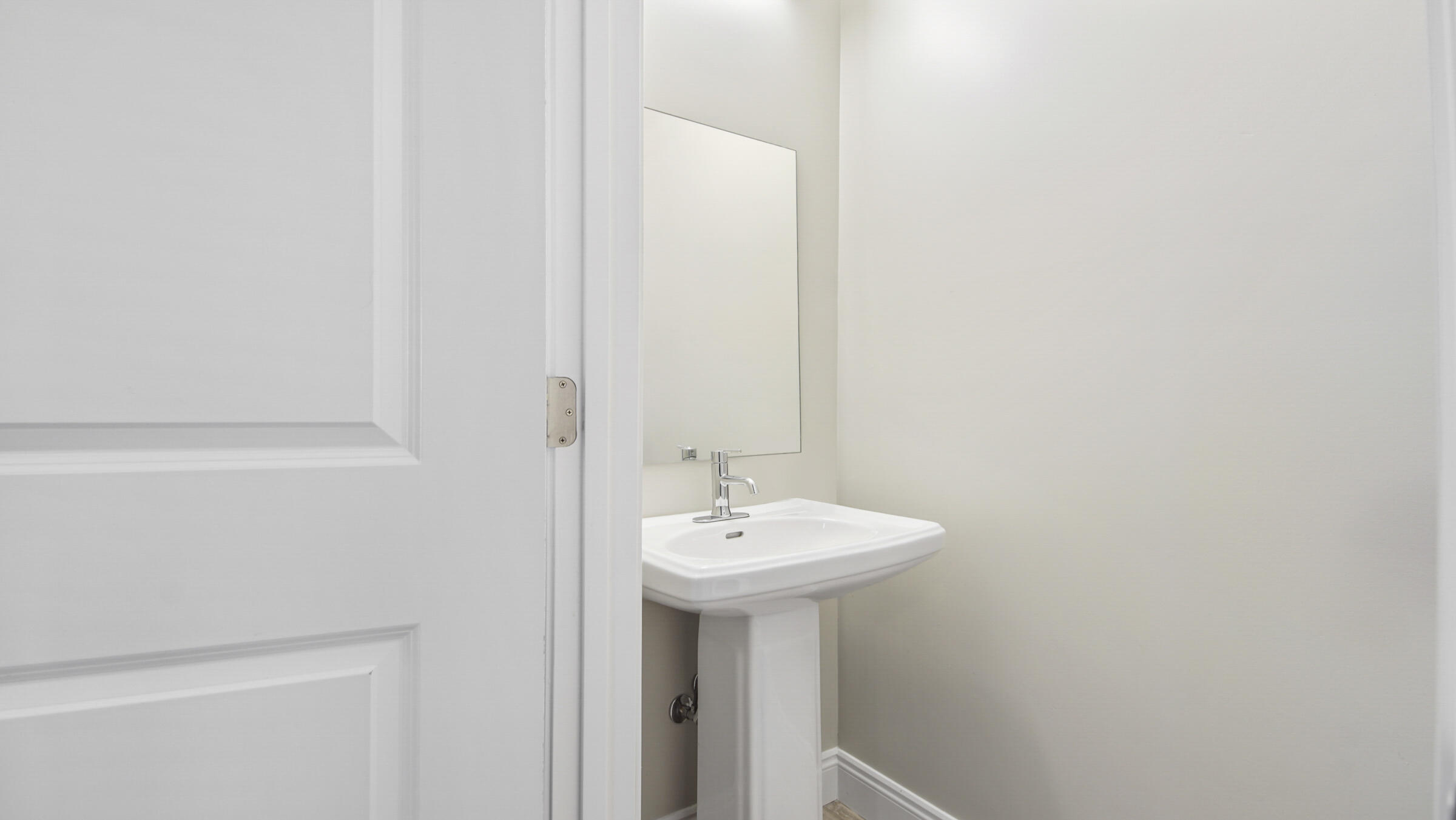 275 Indian Woman Road Santa Rosa Beach, FL 32459 - Photo 37 of 43 a bathroom with a sink a mirror and a vanity
