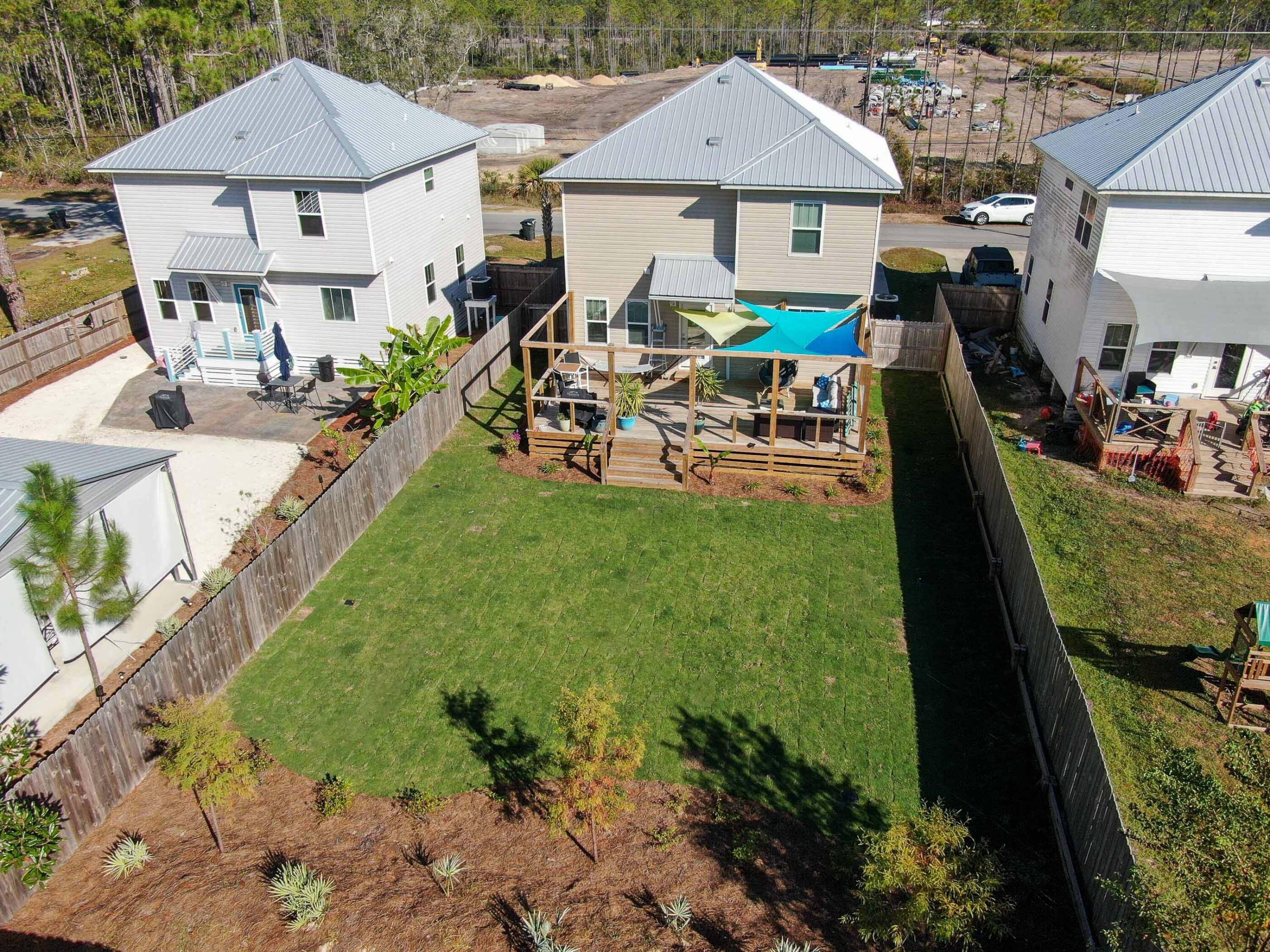 275 Indian Woman Road Santa Rosa Beach, FL 32459 - Photo 39 of 43 a aerial view of a house with swimming pool garden and patio