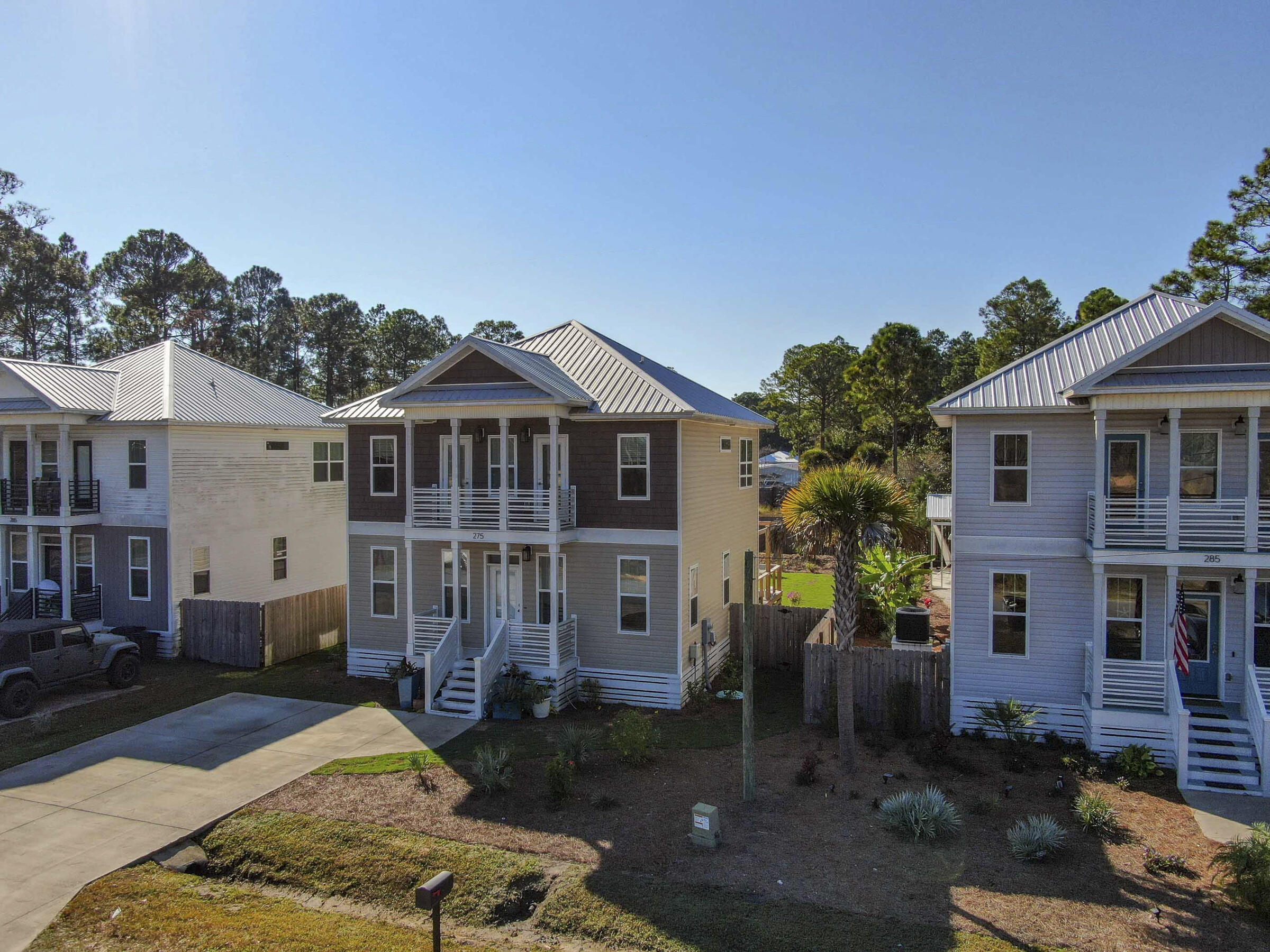 275 Indian Woman Road Santa Rosa Beach, FL 32459 - Photo 40 of 43 front view of a house with a yard