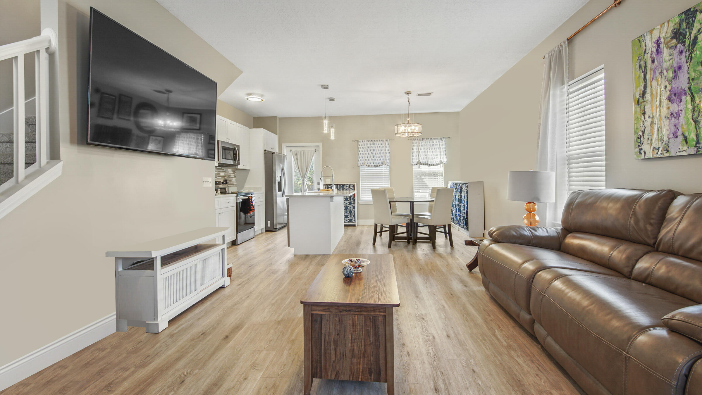 275 Indian Woman Road Santa Rosa Beach, FL 32459 - Photo 4 of 43 a living room with furniture and a wooden floor