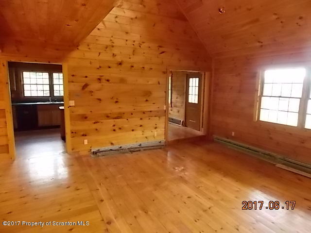 79 Rr 1 Le Raysville, PA 18829 - Photo 11 of 23 en empty room with windows
