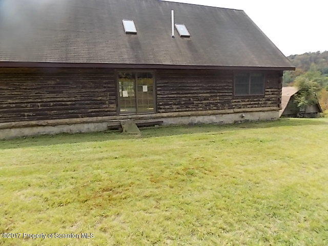 79 Rr 1 Le Raysville, PA 18829 - Photo 2 of 23 a view of a house with a yard