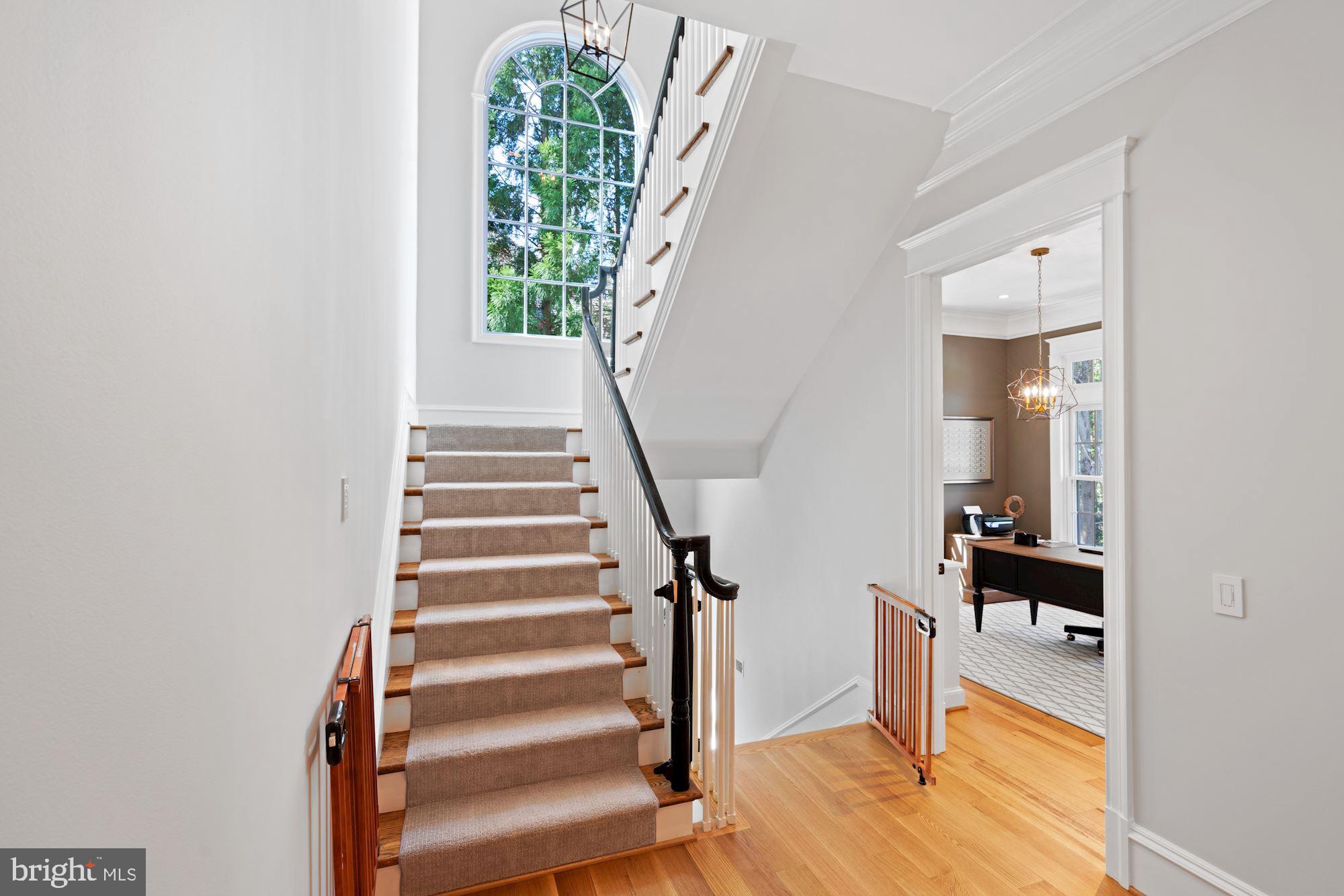 7125 Arrowood Road Bethesda, MD 20817 - Photo 27 of 71 Ascending the Main Staircase
