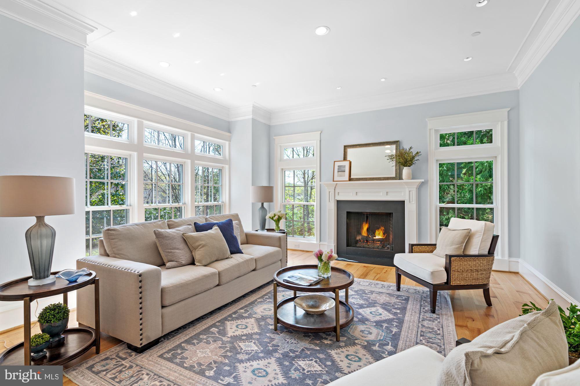 7125 Arrowood Road Bethesda, MD 20817 - Photo 7 of 71 Gas Fireplace and Walls of Windows