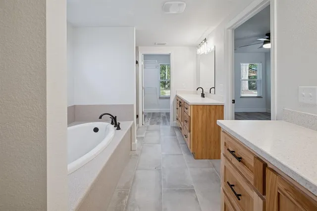 a view of a bathroom with a window