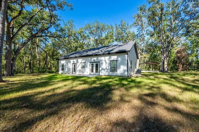 a view of outdoor space with trees all around