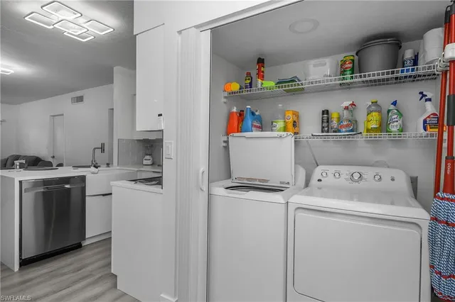 a view of a living room and bathroom