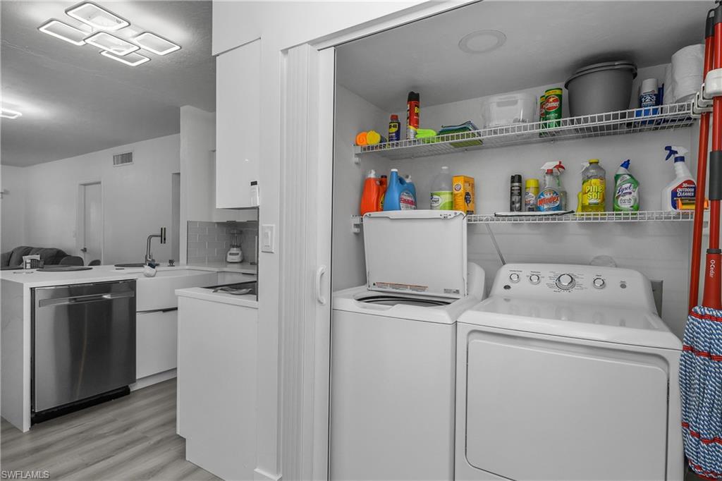 201 South Collier Boulevard, Unit 3102 Marco Island, FL 34145 - Photo 25 of 35 a utility room with dryer and washer