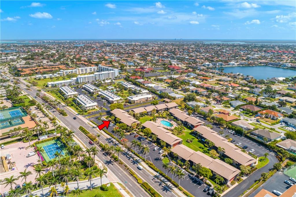 201 South Collier Boulevard, Unit 3102 Marco Island, FL 34145 - Photo 34 of 35 an aerial view of residential building with outdoor space