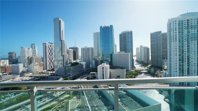 a view of a city with tall buildings