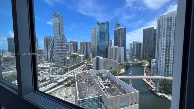 a view of a balcony with a floor to ceiling window