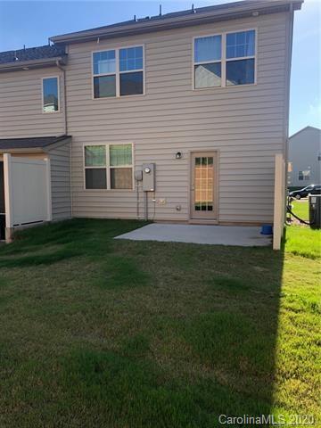 521 Common Raven Court Fort Mill, SC 29715 - Photo 20 of 25 a view of a house with a yard
