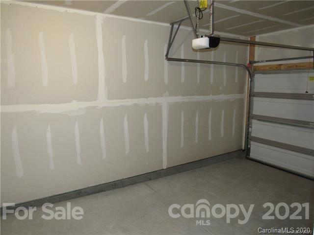 521 Common Raven Court Fort Mill, SC 29715 - Photo 22 of 25 a view of a room with racks on the wall