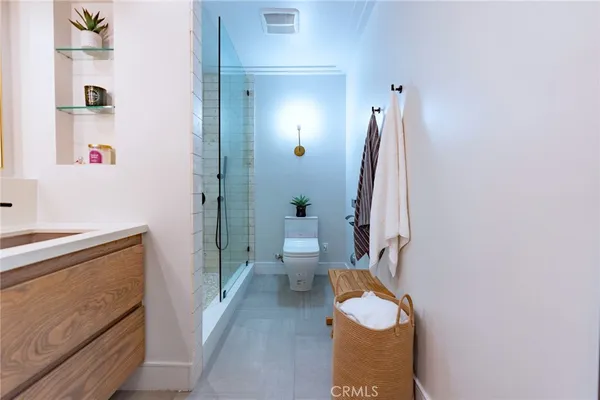 a bathroom with a sink and toilet