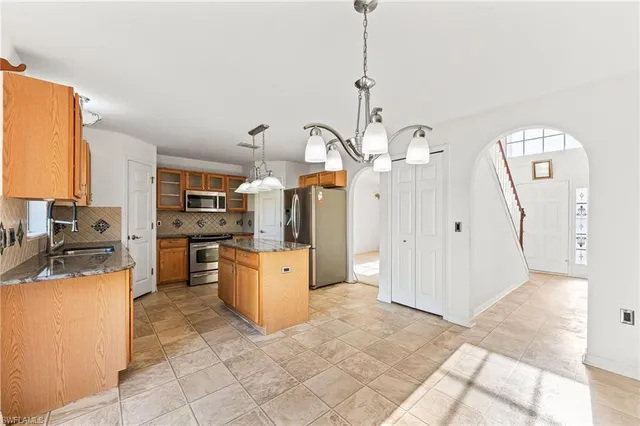 a bathroom with a sink a mirror and a bathtub