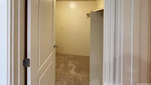 a bathroom with a glass door shower and a sink