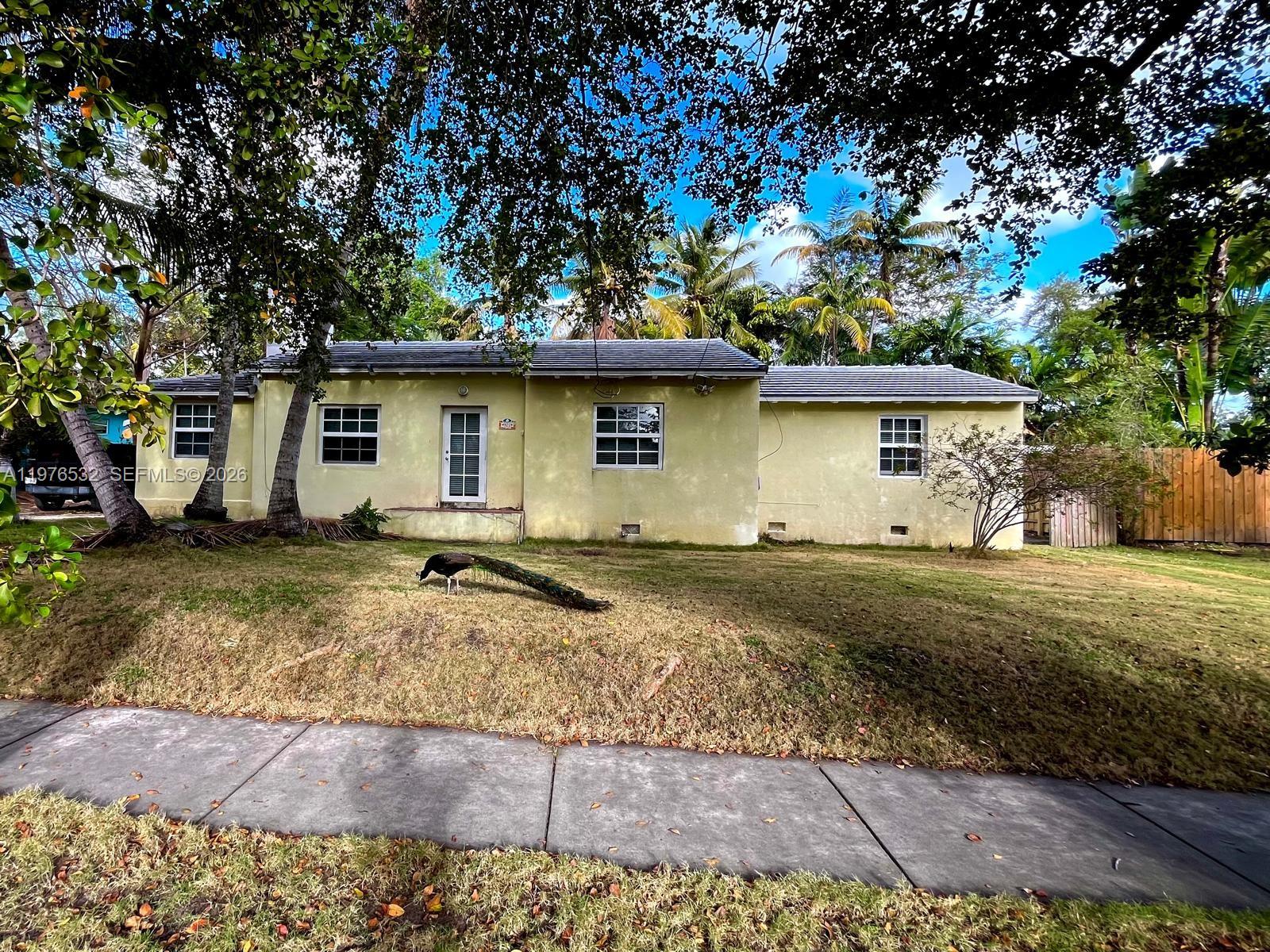 901 Northwest 10th Court Miami, FL 33136 - Photo 6 of 13 a view of a house with a yard