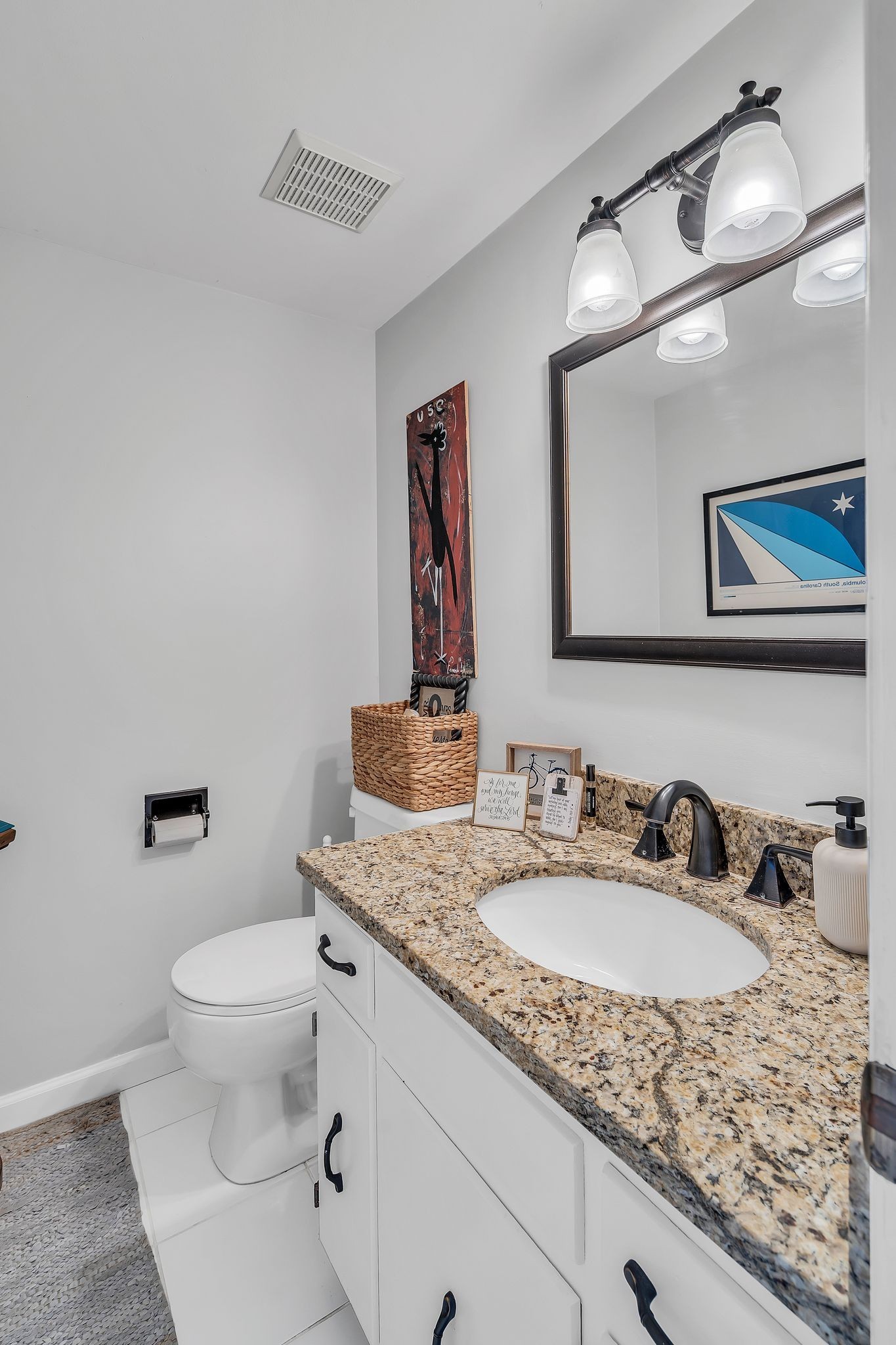 318 Huntington Ridge Drive Nashville, TN 37211 - Photo 17 of 29 a bathroom with a granite countertop sink a toilet and a mirror