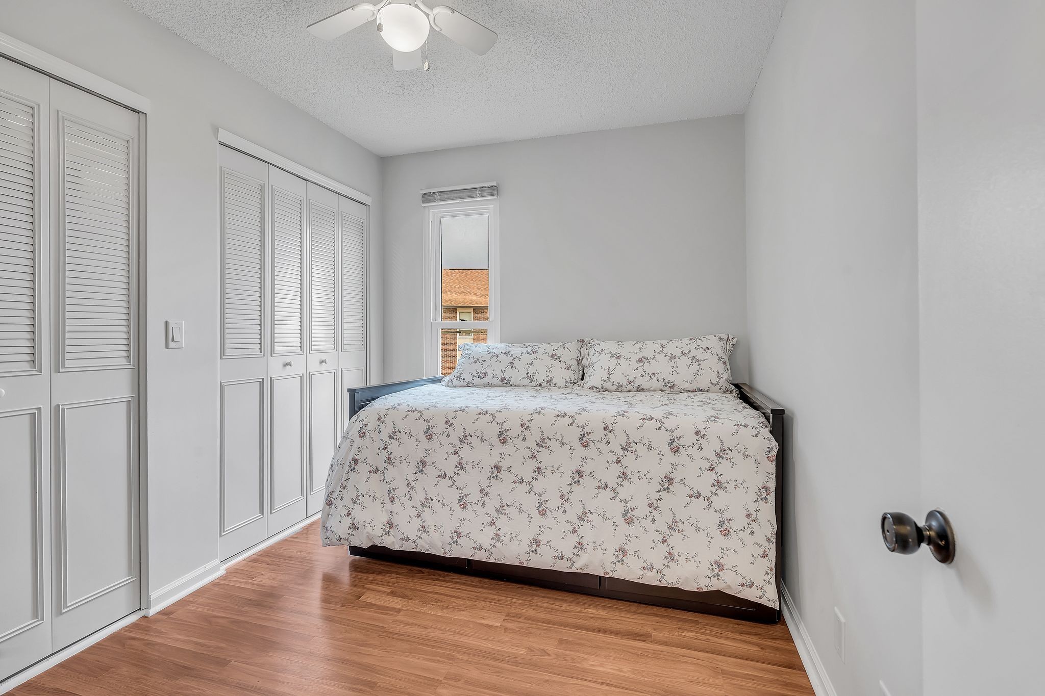 318 Huntington Ridge Drive Nashville, TN 37211 - Photo 22 of 29 a bedroom with a bed and a chandelier