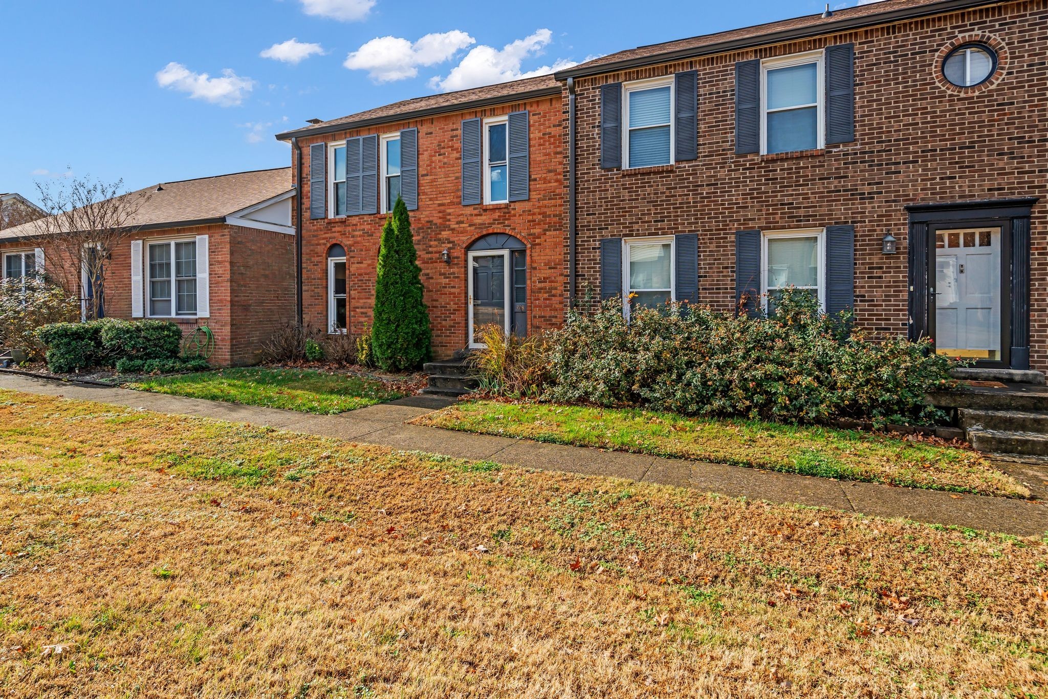 318 Huntington Ridge Drive Nashville, TN 37211 - Photo 6 of 29 a front view of a house with garden