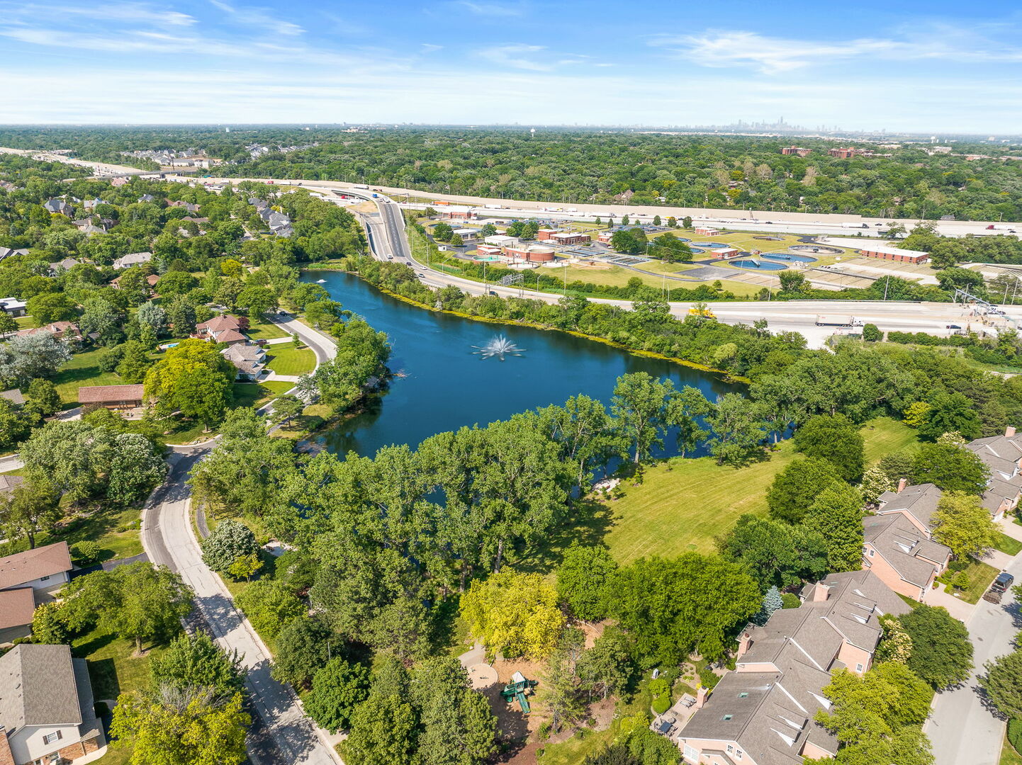124 Carriage Way Drive, Unit B109 Burr Ridge, IL 60527 - Photo 30 of 31 a view of lake with city view