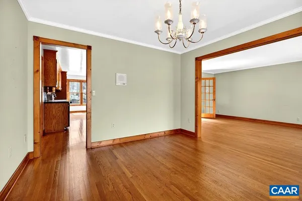 a view of hallway with windows