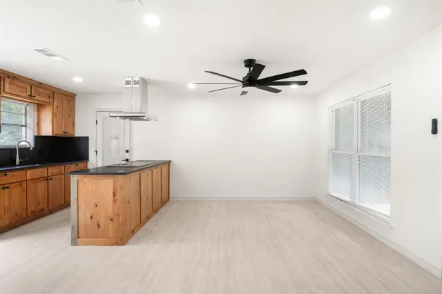 a view of a livingroom with a flat screen tv