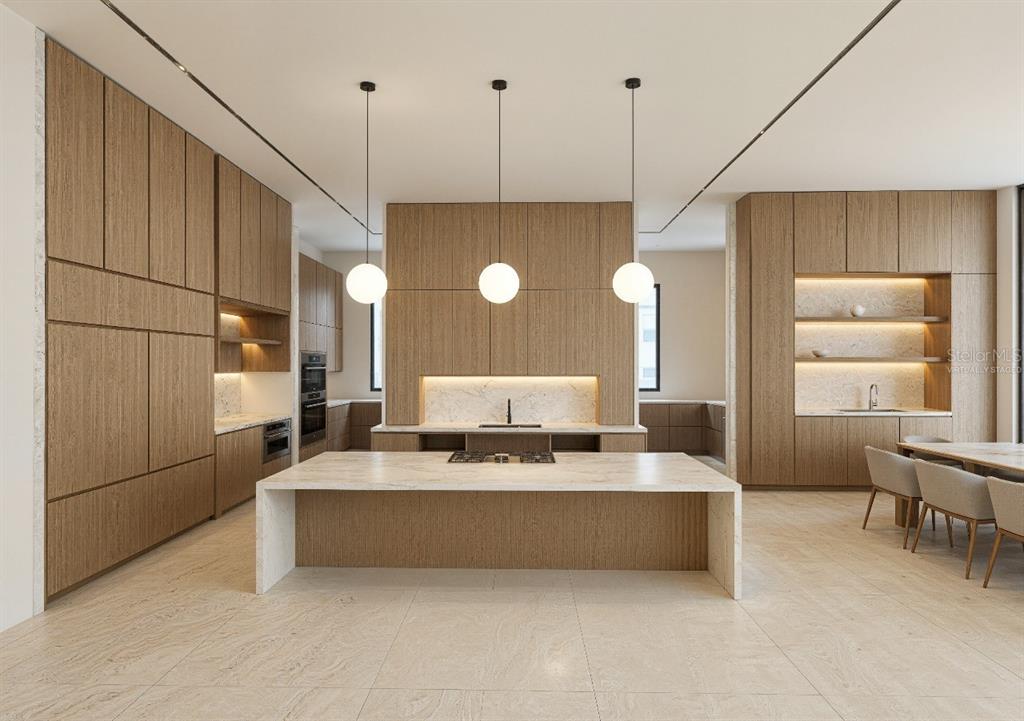 9700 Blandford Road Orlando, FL 32827 - Photo 5 of 19 a large room with kitchen island a sink a chandelier stainless steel appliances and cabinets