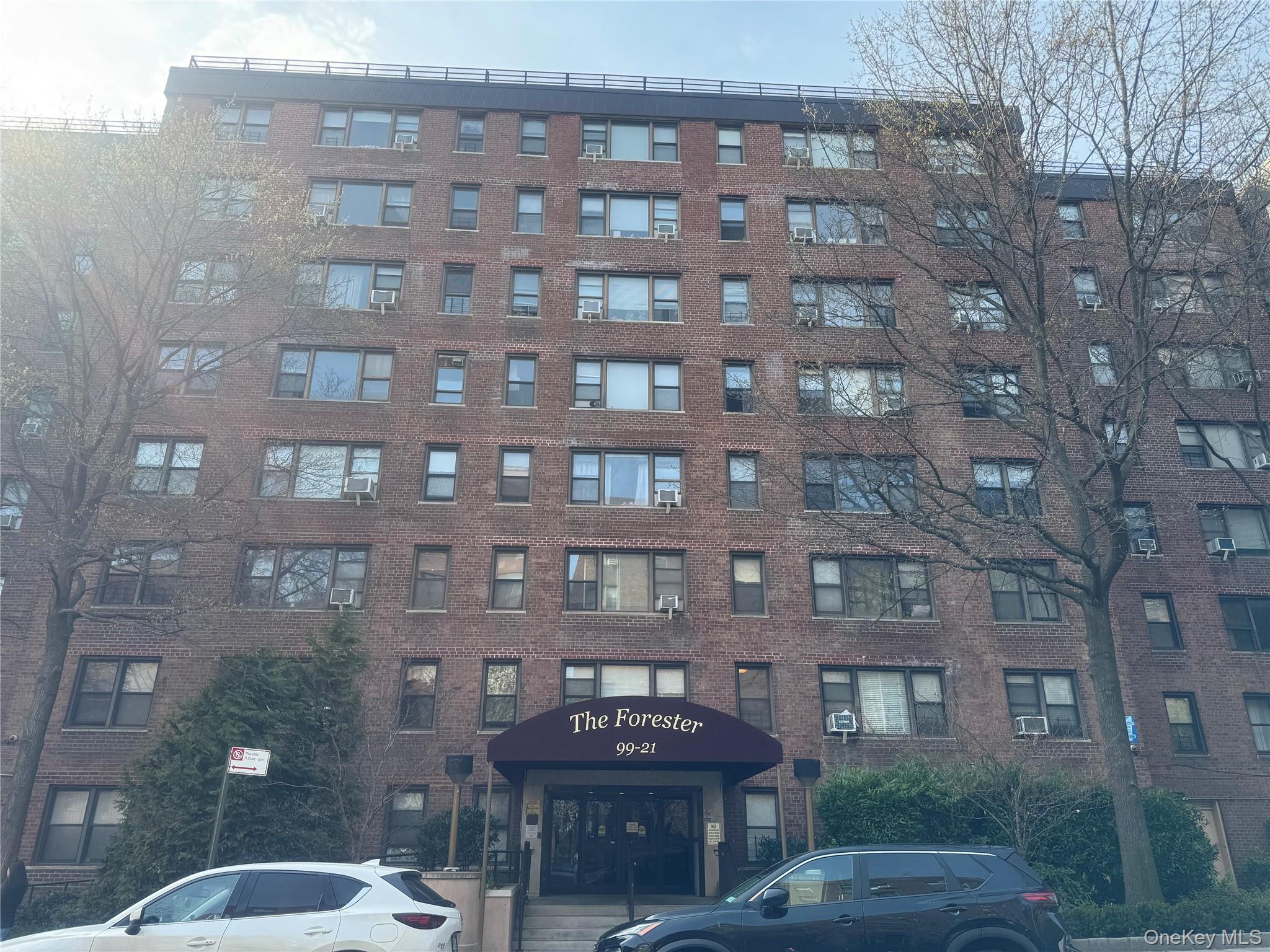 99-21 67th Road, Unit 7K Queens, NY 11375 - Photo 1 of 10 a front view of a building