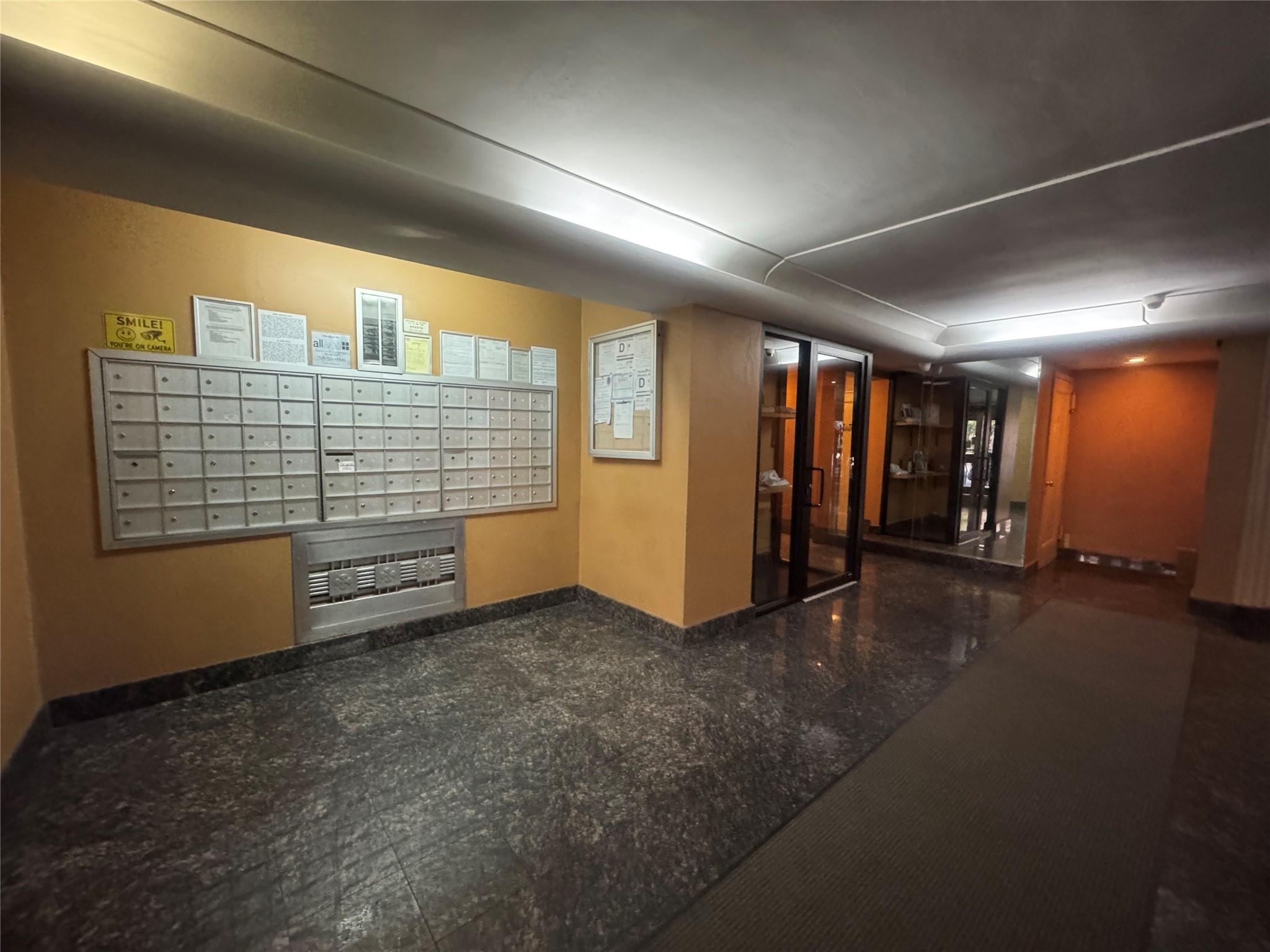 99-21 67th Road, Unit 7K Queens, NY 11375 - Photo 3 of 10 a view of an empty room with a window