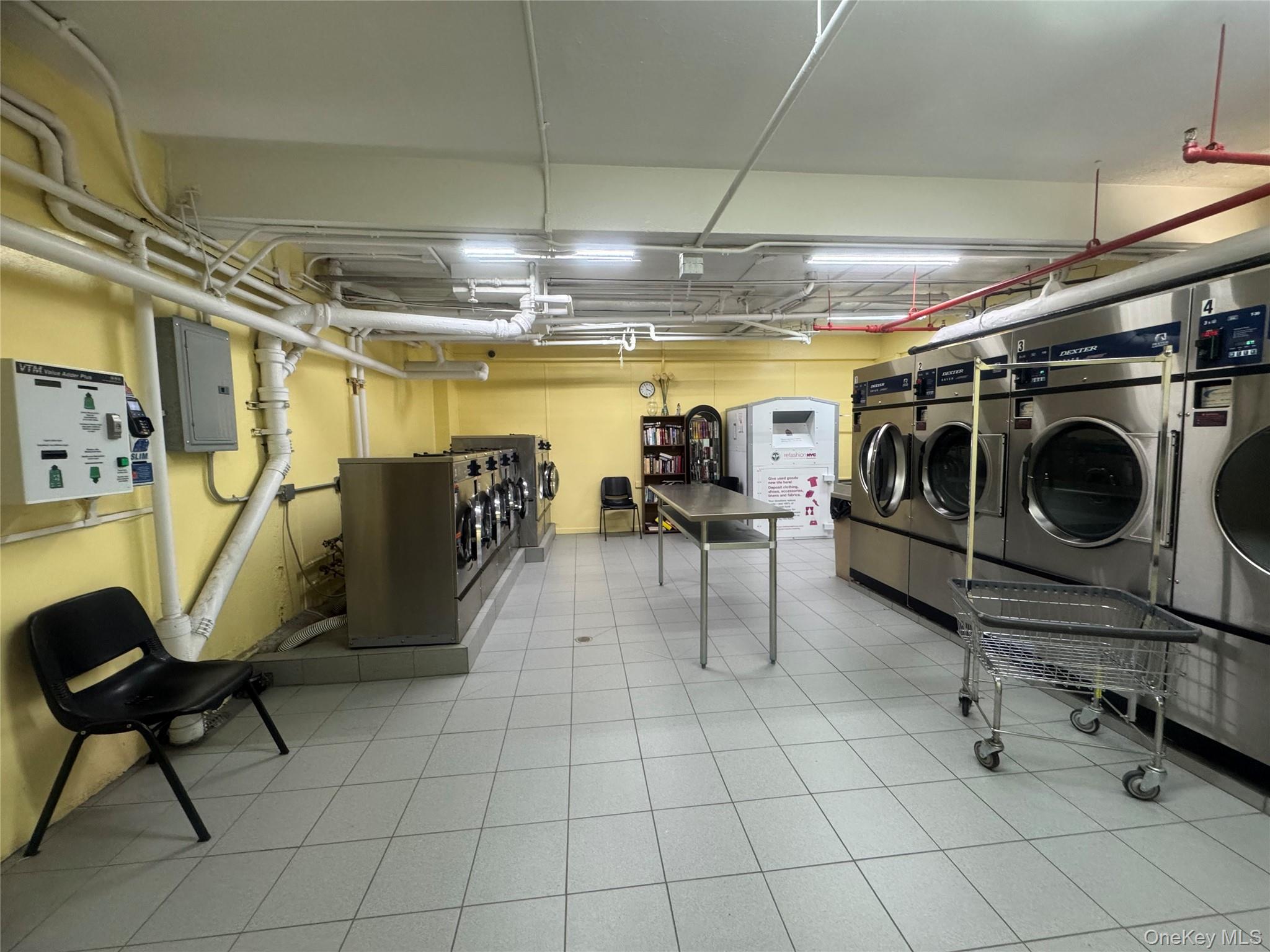 99-21 67th Road, Unit 7K Queens, NY 11375 - Photo 10 of 10 a view of a room with gym equipment