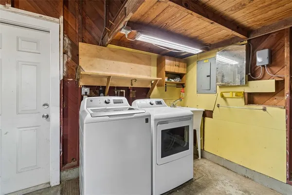 a utility room with dryer and washer