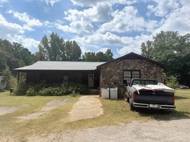 a car parked in front of a house