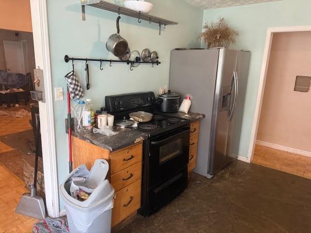 290 New Hope Road McDonough, GA 30252 - Photo 11 of 21 a kitchen with stainless steel appliances granite countertop a refrigerator and a stove top oven