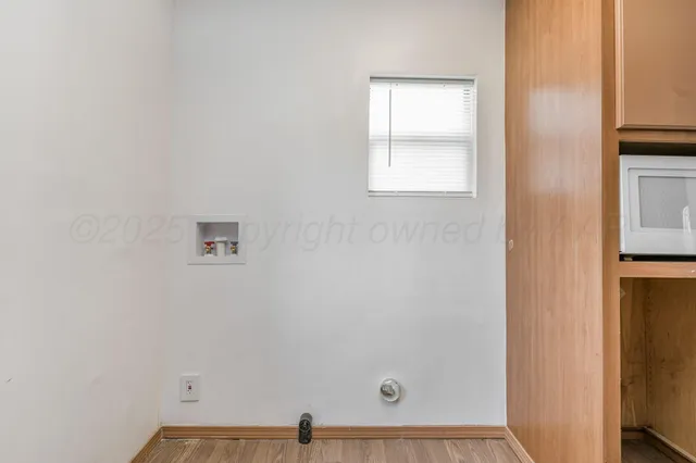 a view of a small space with window