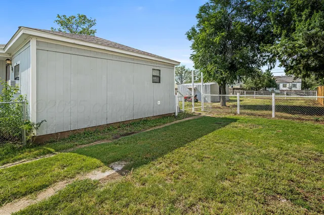 a house view with a garden space