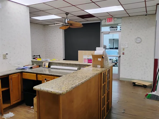 a view of a chairs and tables in patio
