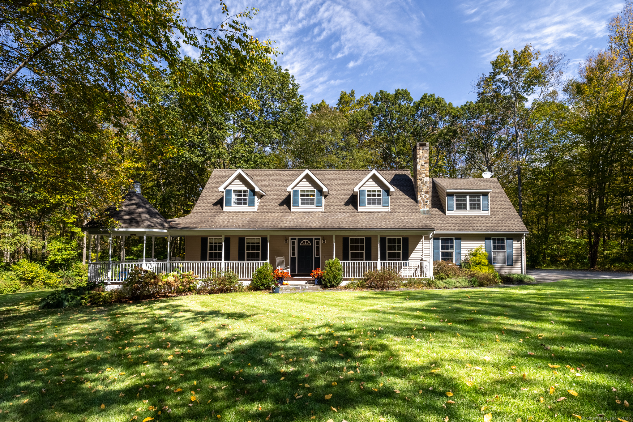 124 Auncient Oak Road Bethlehem, CT 06751 - Photo 1 of 1 a front view of a residential houses with yard and green space