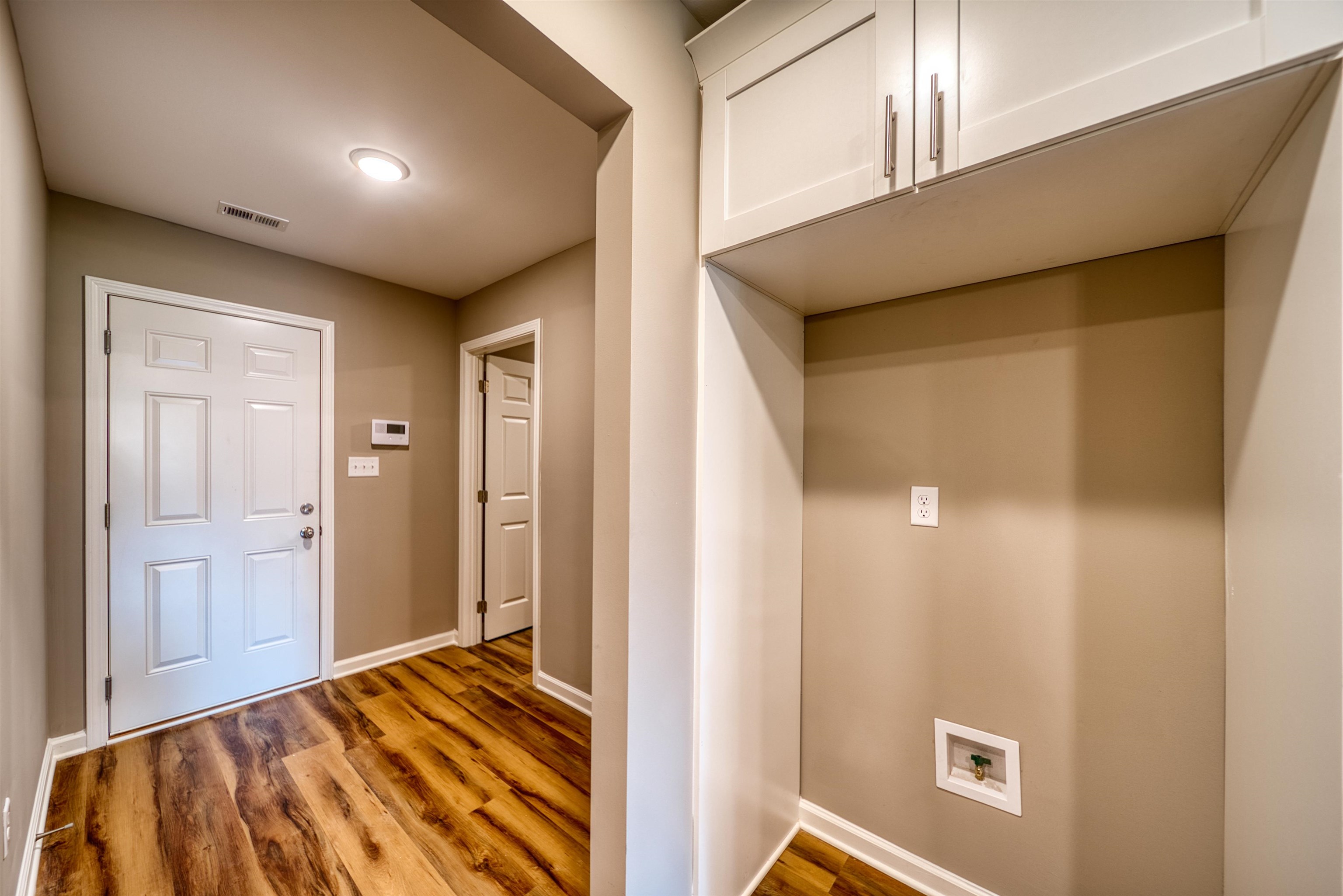 109 Walnut Ridge Ripley, TN 38063 - Photo 13 of 39 Entrance foyer with wood finished floors and baseboards