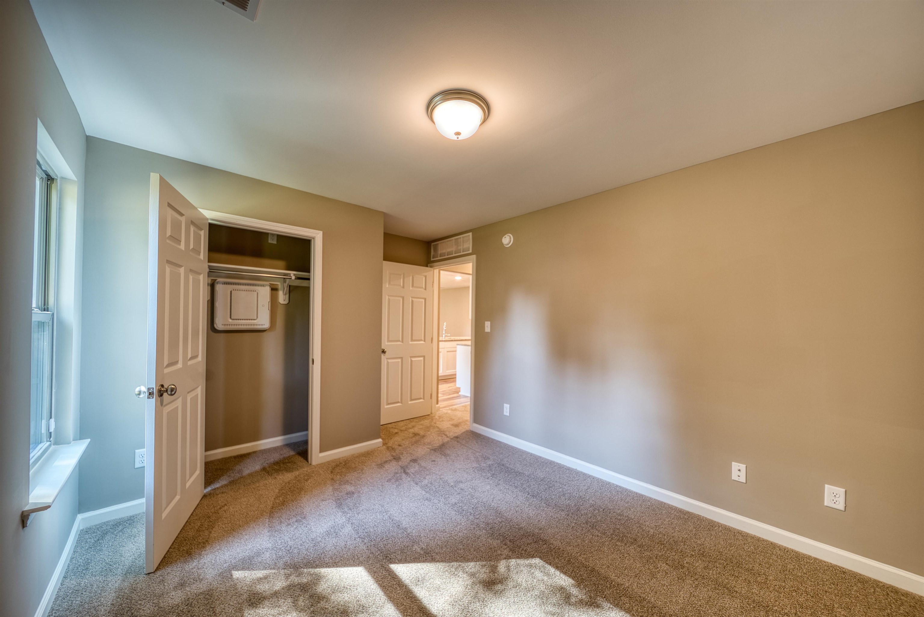 109 Walnut Ridge Ripley, TN 38063 - Photo 18 of 39 a view of a livingroom with wooden floor and closet