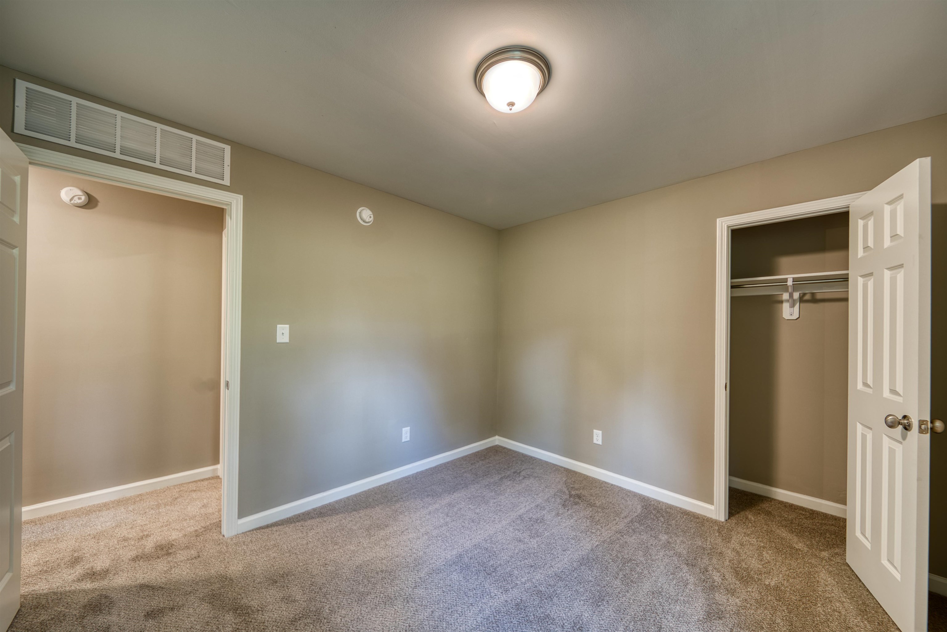 109 Walnut Ridge Ripley, TN 38063 - Photo 19 of 39 Unfurnished bedroom with carpet floors and a closet