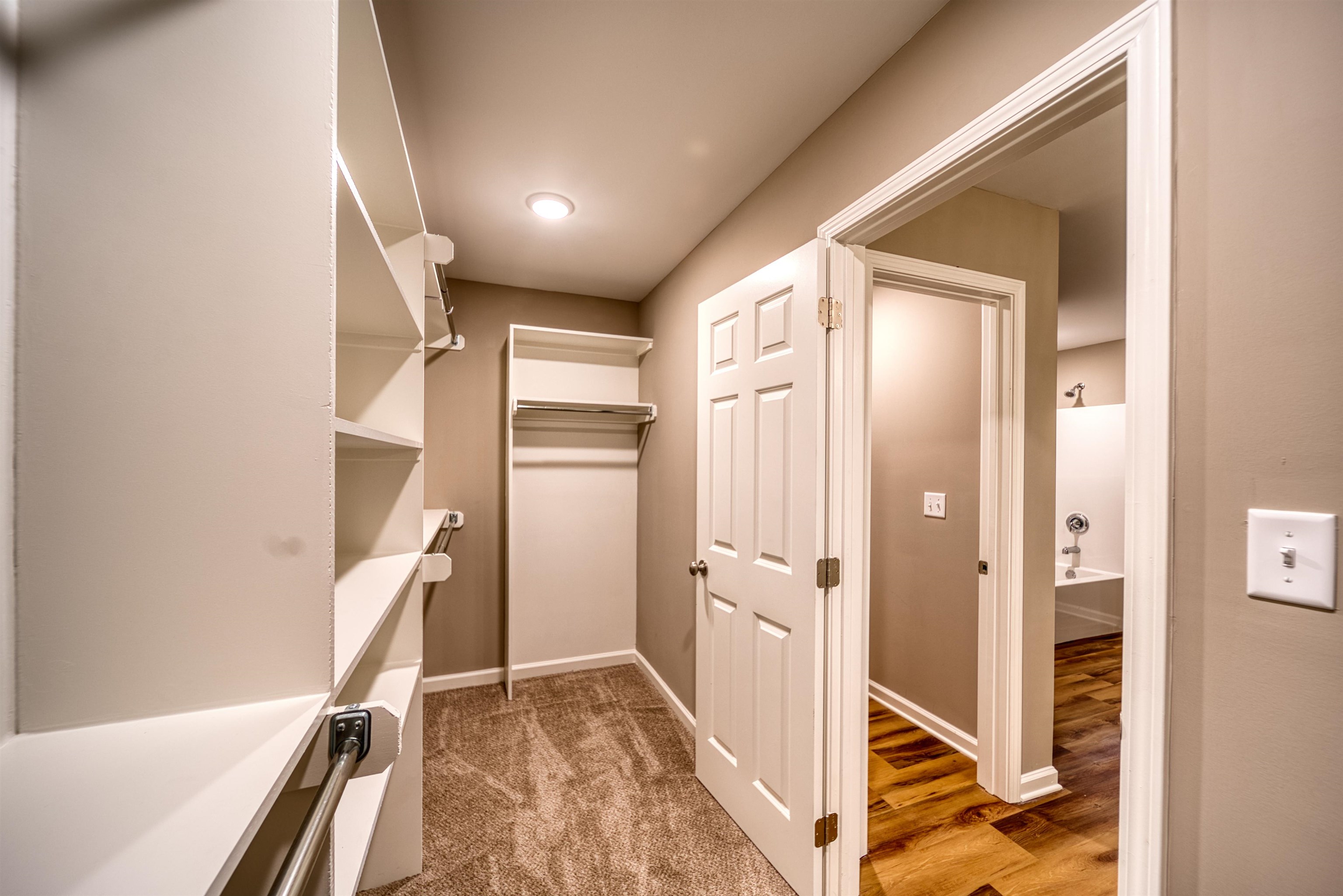 109 Walnut Ridge Ripley, TN 38063 - Photo 23 of 39 Walk in closet featuring light wood-style floors