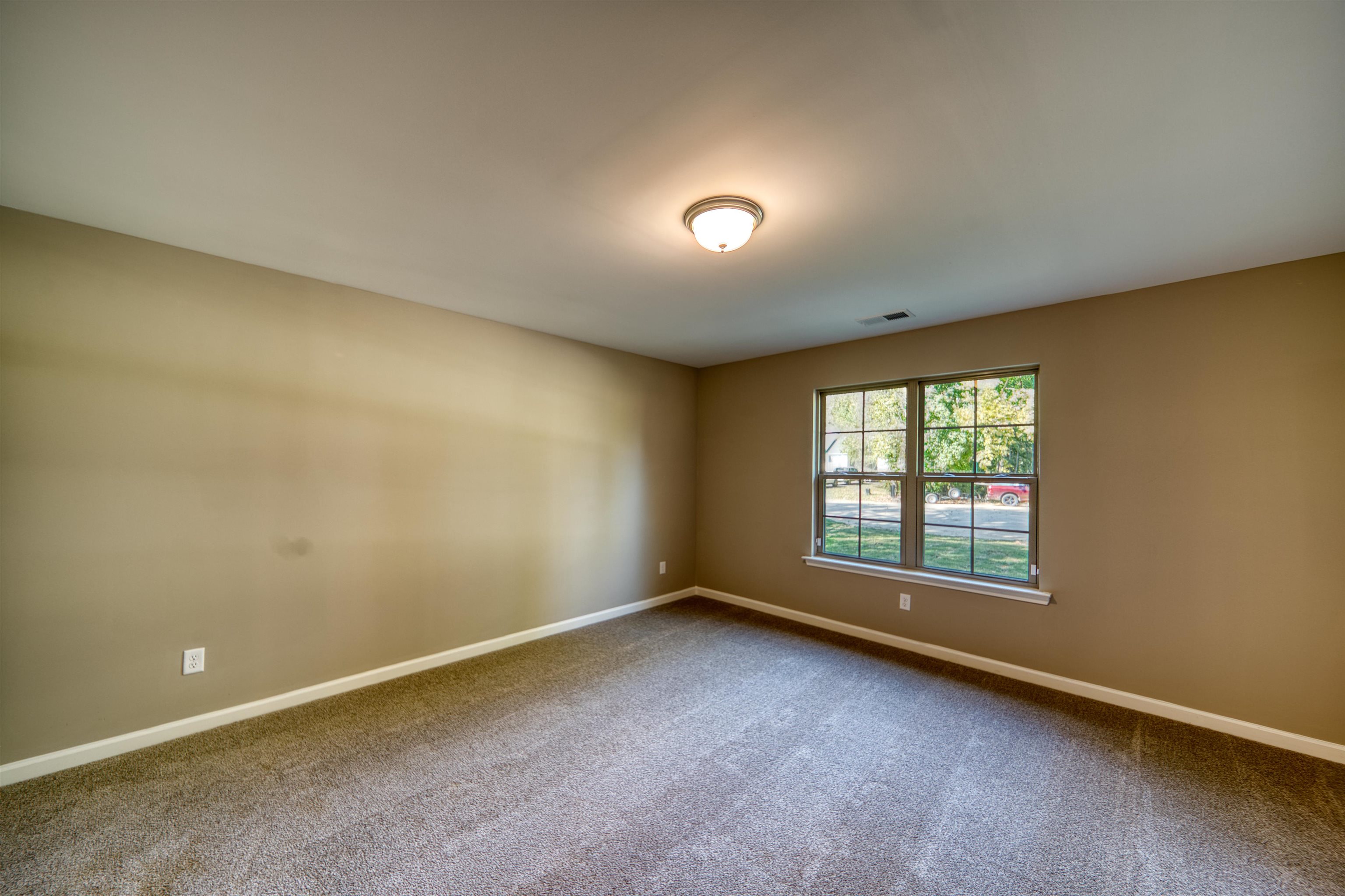 109 Walnut Ridge Ripley, TN 38063 - Photo 27 of 39 an empty room with a window