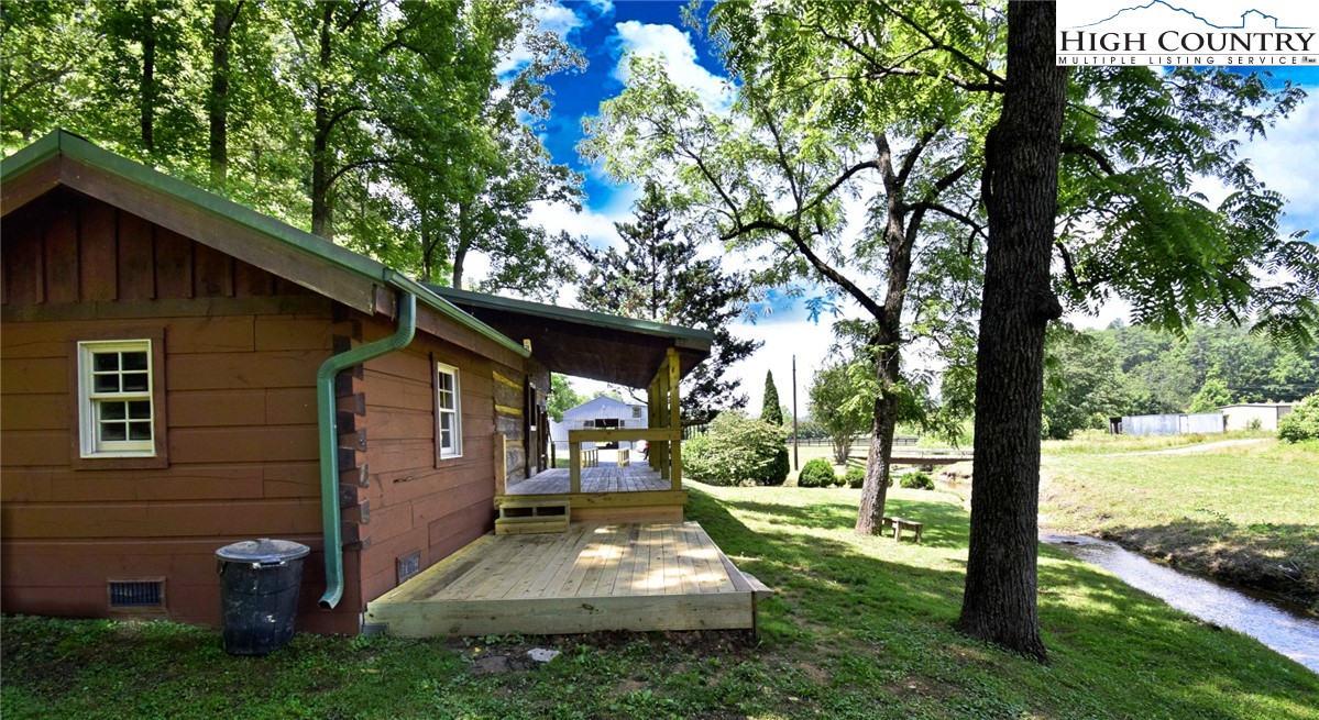 a backyard of a house with seating space
