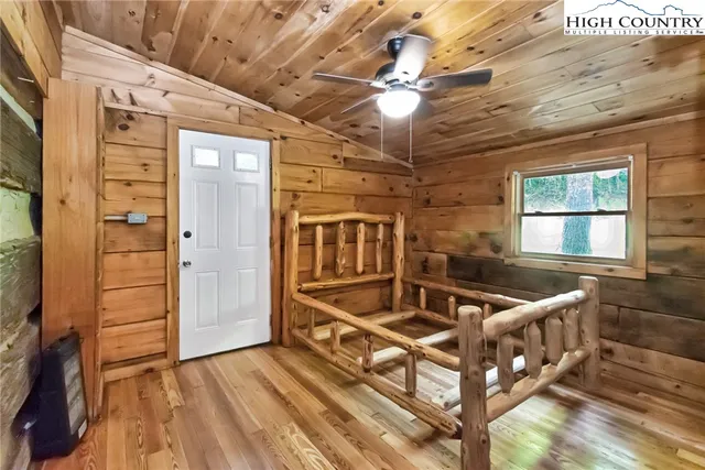a view of an chairs and table in the balcony